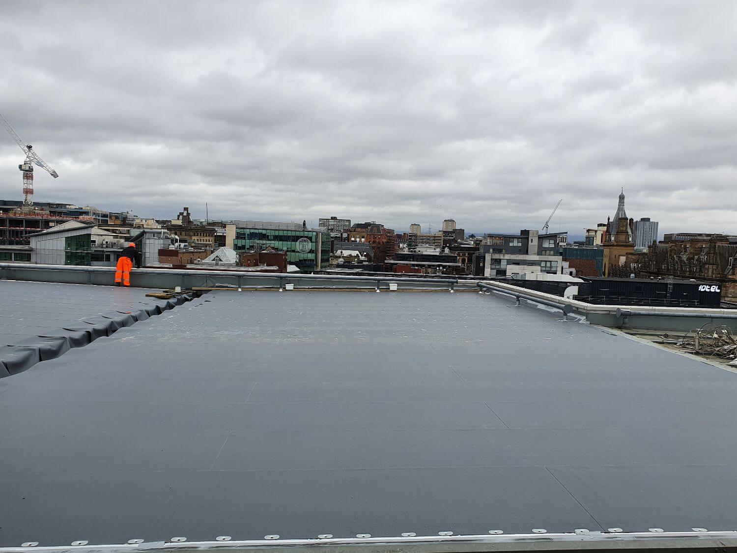in progress installation of overlay system for commercial building in Glasgow